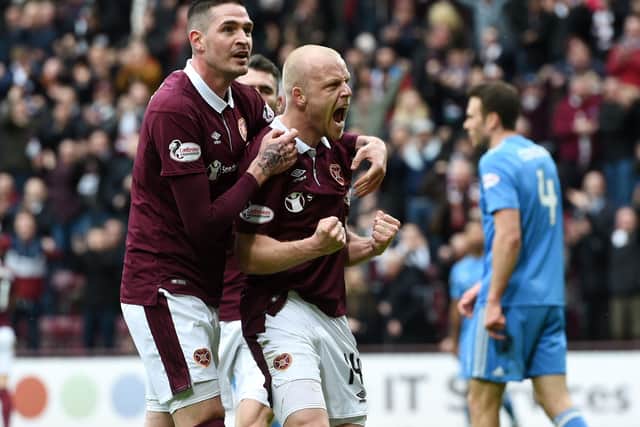 Kyle Lafferty - alongside Hearts' current technical director Steven Naismith - during his time in Gorgie. Picture: SNS