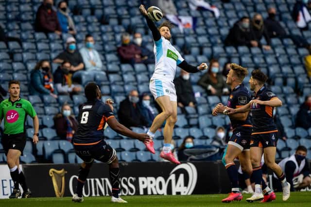 Fans watch from the stands for the first time since March as Glasgow's Tommy Seymour goes for a high ball at BT Murrayfield. Picture: SRU/SNS Group