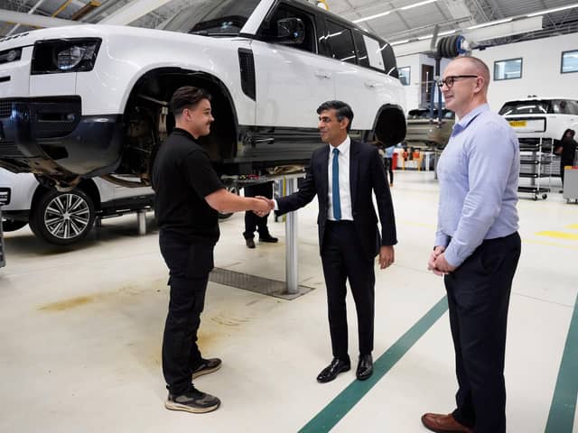 Rishi Sunak visited a Land Rover plant in Warwick in July for an announcement about a new electric car battery factory (Picture: Christopher Furlong/Getty Images)