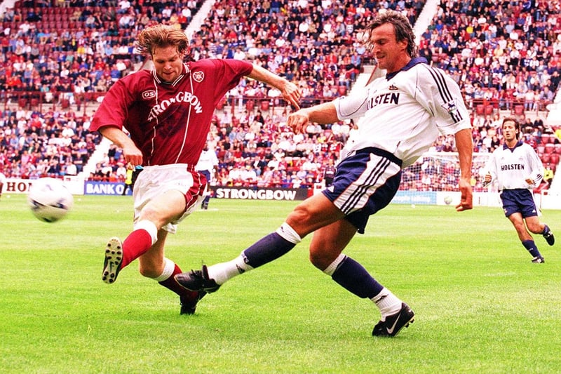 French winger David Ginola is pictured playing against Hearts in a friendly in 1999 at Tynecastle Park, which finished 2-2.