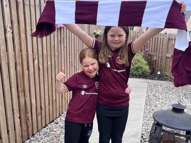 Scarf flying high in the garden ahead of the big kick-off...
Pic: Danielle Young