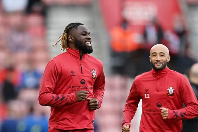 Dynel Simeu, left, and Nathan Redmond of Southampton warm up ahead of the Premier League match against Tottenham Hotspur at St Mary's in December last year