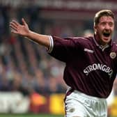 Hearts striker John Robertson celebrates after scoring against Rangers in 1997.