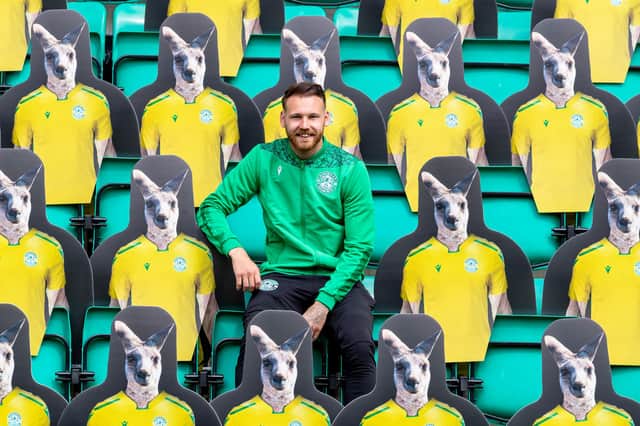 Martin Boyle (centre) poses with the carboard kangaroos at Easter Road