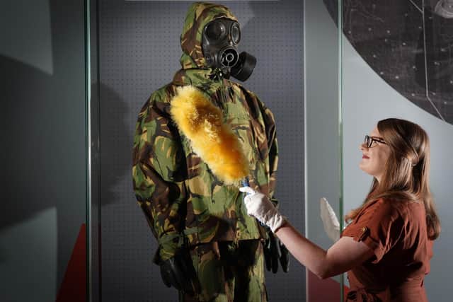 Cold War researcher Sarah Harper puts the finishing touches to Cold War Scotland, a new exhibition at the National Museum of Scotland. Picture: Stewart Attwood