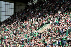 A review of fans being able to return to football stadiums will likely take place month. Picture: SNS