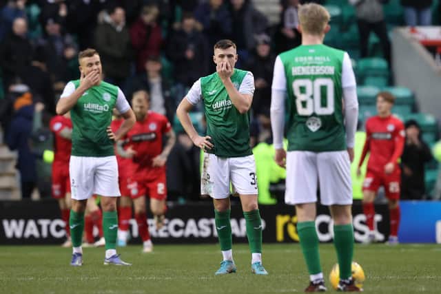 Hibs' Ryan Porteous and Josh Campbell look dejected after St Mirren make it 1-0 at Easter Road.