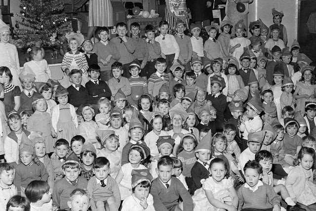 A children's party organised by the British Legion, in Musselburgh Legion Hall, in December 1964.