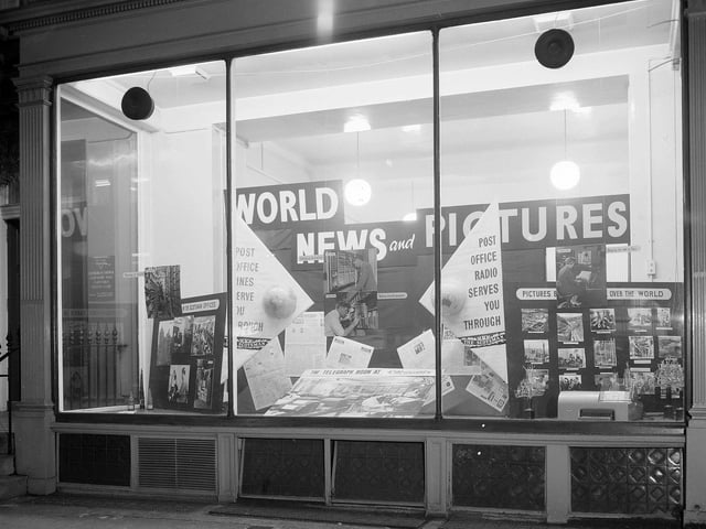 This window of a shop at 118 George Street, in November 1961, featured a display of photographs from The Scotsman showing the work of Post Office Radio in delivering pictures to the newspaper.