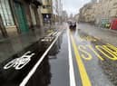 Floating bus stops are positioned between cycle lanes and the roadway