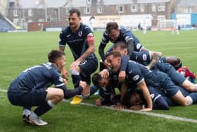 Raith Rovers players celebrate scoring against Dunfermline on Saturday.