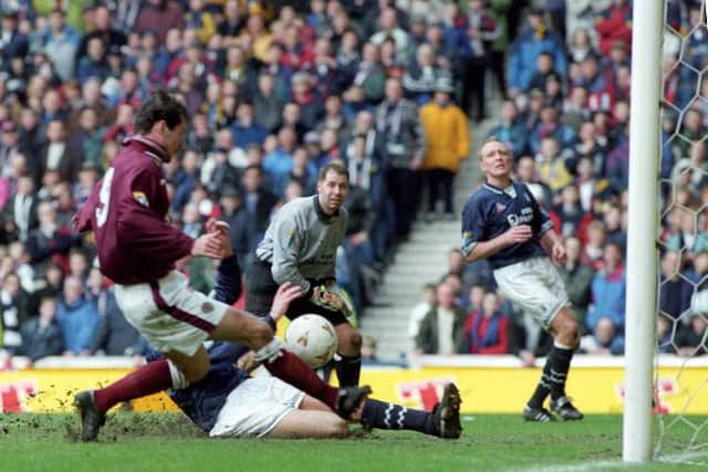 04/04/98 TENNENT'S SCOTTISH CUP SEMI-FINAL
FALKIRK v HEARTS (1-3)
IBROX - GLASGOW
Stephane Adam scores for Hearts.