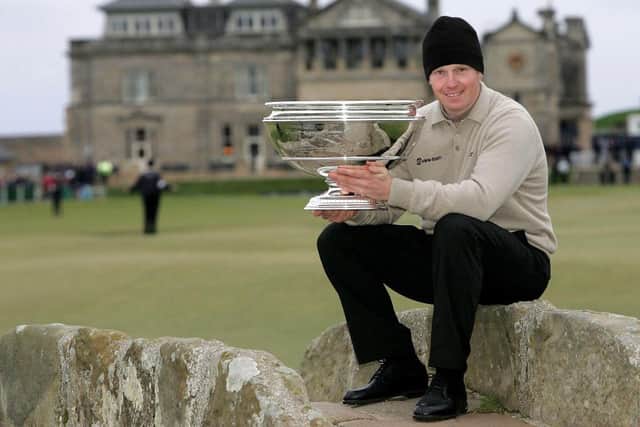 Stephen Gallacher poses with the trophy after winning the 2004 Dunhill Links Championship at St Andrews. Picture: Andrew Redington/Getty Images.
