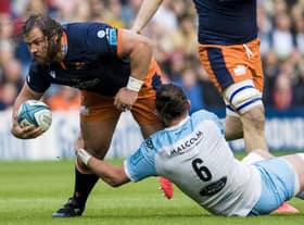 Pierre Schoeman (left) in typically combative action for Edinburgh during the win over Glasgow Warriors at BT Murrayfield.  (Photo by Ross Parker / SNS Group)