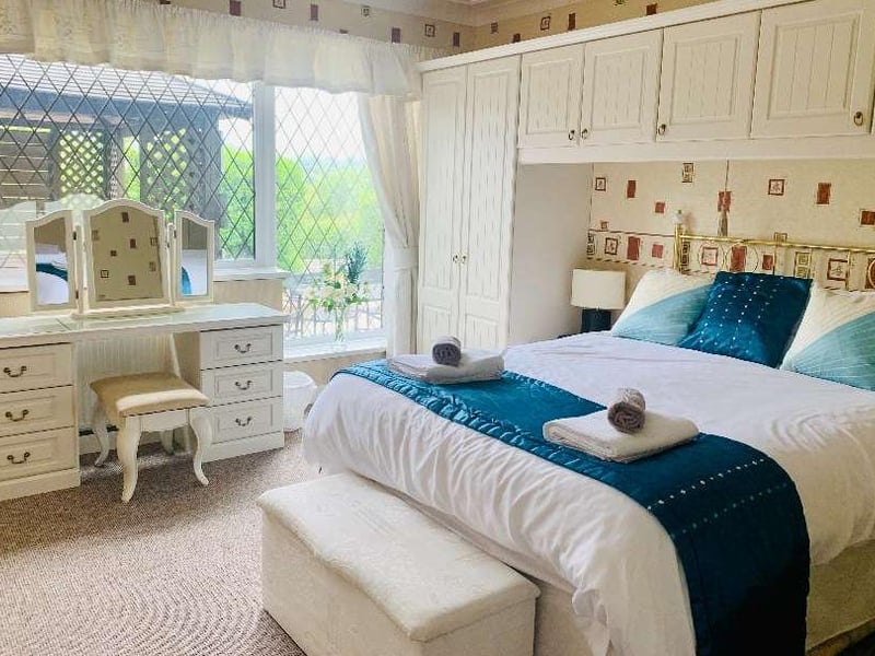 One of the eight bedrooms.