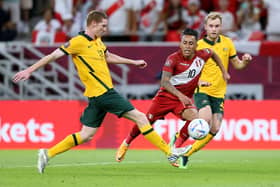 Kye Rowles and Nathaniel Atkinson teaming up for Australia against Peru during the 2022 World Cup play-off in Qatar last month. Picture: Mohamed Farag/Getty