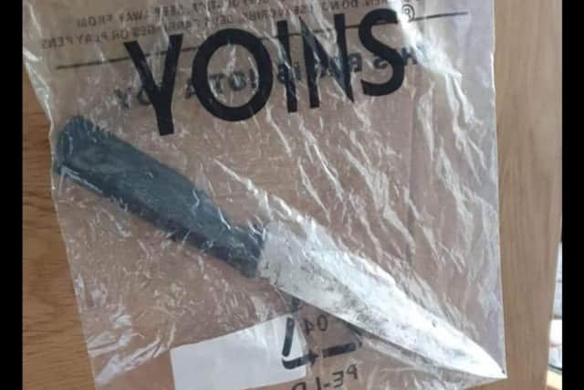 A knife that was found stashed under a residents fence in the Clermiston/Drumbrae area.