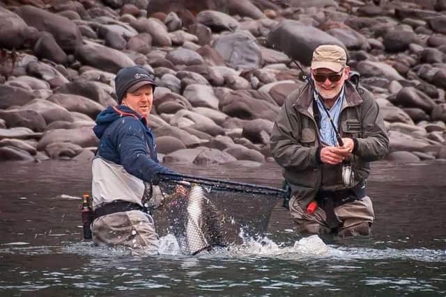 The joy of netting a salmon with a Mackenzie Fly Fishing FX2 rod. Contributed by Scott Mackenzie