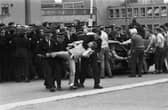 Members of the NUM miners' union picket line clash with police outside Bilston Glen colliery during the miners strike  in June 1984. Four policemen struggle with a picket.