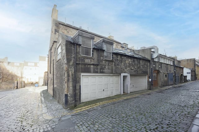 Nestled in a lane in Edinburgh's New Town, this two-bedroom flat is on the market.