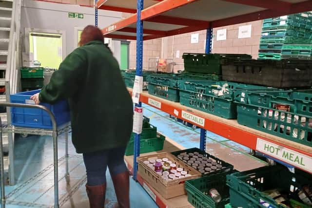 The shelves at Edinburgh Food Project's Broomhouse warehouse are emptying quicker than they are being filled in the run-up to Christmas.