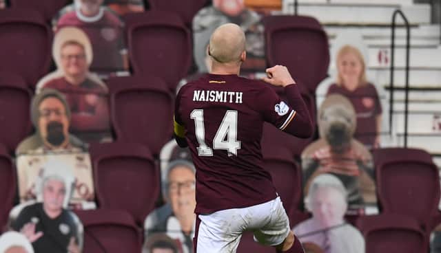 Stevie Naismith celebrates after opening the scoring for Hearts. Picture: SNS