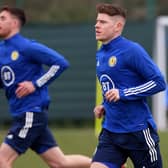 Hibs striker Kevin Nisbet (foreground) trains for the first time with his new Scotland teammates  (Photo by Craig Williamson / SNS Group)