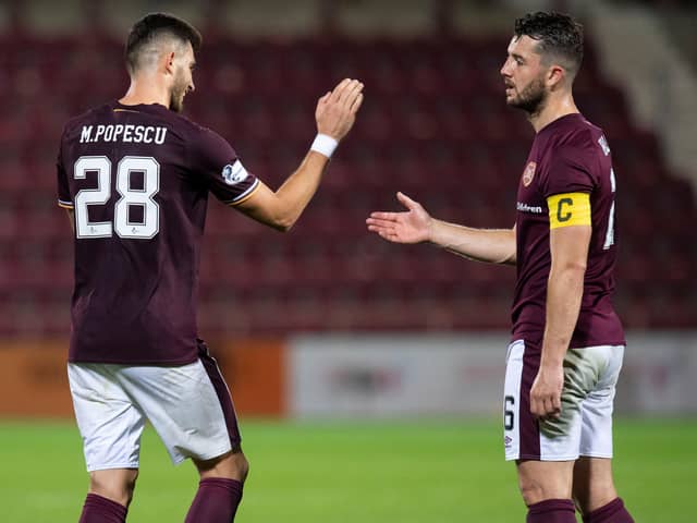 Hearts centre-backs Mihai Popescu and Craig Halkett are still buidling a relationship at the back. Picture: SNS