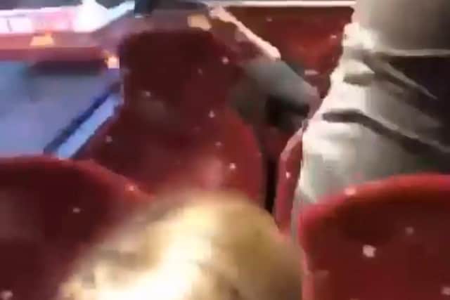 This clip shows a teenage girl being repeatedly punched to the head by another girl on the backseat of a bus.