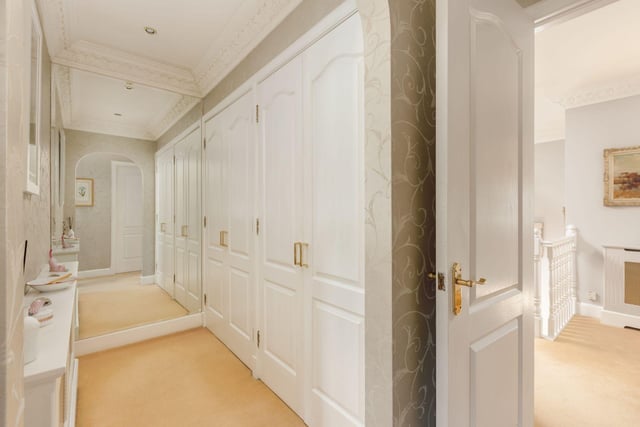 The added bonus of this dressing room, situated off the principal bedroom in this luxury Midlothian property.
