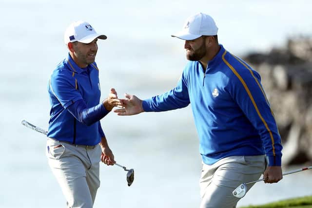 Sergio Garcia and Jon Rahm celebrate on the eighth green during the opening session in the 43rd Ryder Cup at Whistling Straits. Picture: Patrick Smith/Getty Images.