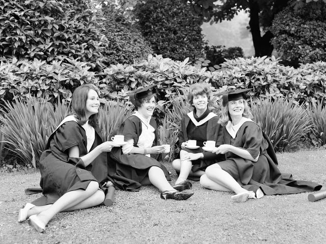 A group of Edinburgh University graduates relax in the gardens at George Street in July 1963.