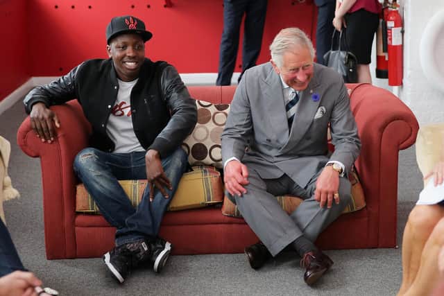 The Prince of Wales on a sofa with Jamal Edwards during a live session at the launch of the Prince's Trust Summer Sessions at the Princes's Trust in Historic Chatham Dockyard in Chatham, Kent.