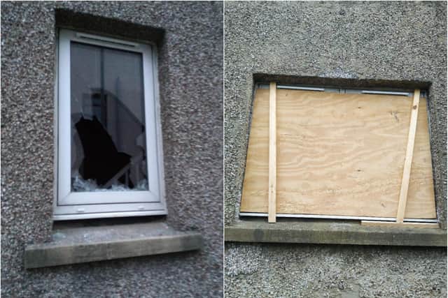 A broken window in the neighbouring property.