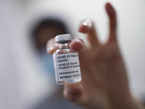 File photo dated 04/02/21 of a vial of the Oxford/AstraZeneca coronavirus vaccine. UK leaders and medical experts have defended the use of the AstraZeneca vaccine despite multiple European countries pausing its use due to concerns over possible adverse side effects. Issue date: Tuesday March 16, 2021.