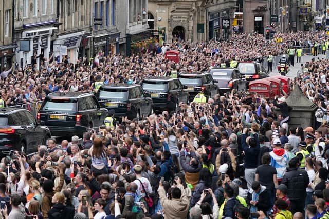 Huge crowds turned out to pay their respects as the cortege carrying the coffin of the late Queen Elizabeth II passed through Edinburgh (Picture: Ian Forsyth/WPA pool/Getty Images)