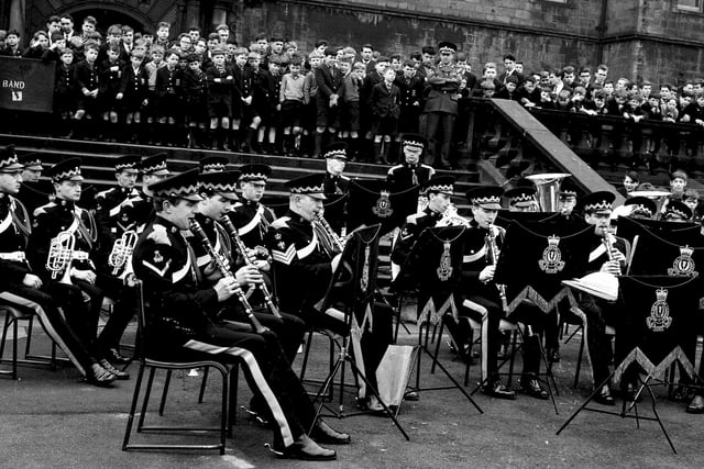 Pupils listen to a performance Royal Scots Greys Regimental Band at George Heriot's School in March 1963.