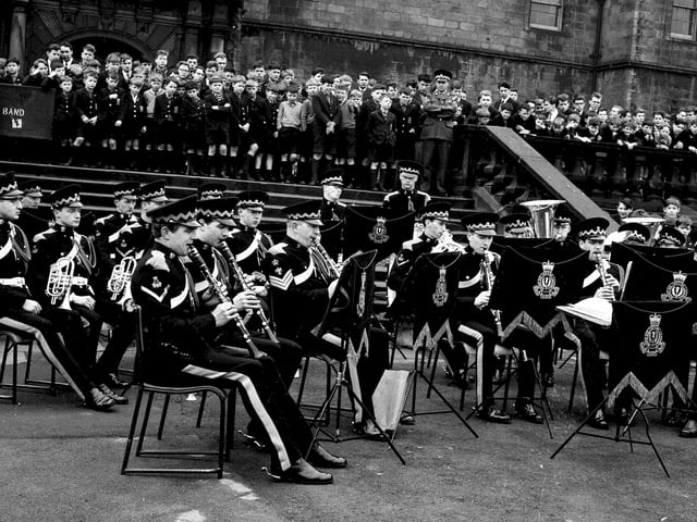 Pupils listen to a performance Royal Scots Greys Regimental Band at George Heriot's School in March 1963.