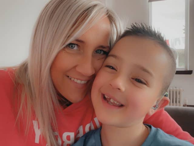 Carrie-Ann Farquhar with son Jamie, who lost out on vital help because doctors took three years to acknowledge he was deaf.