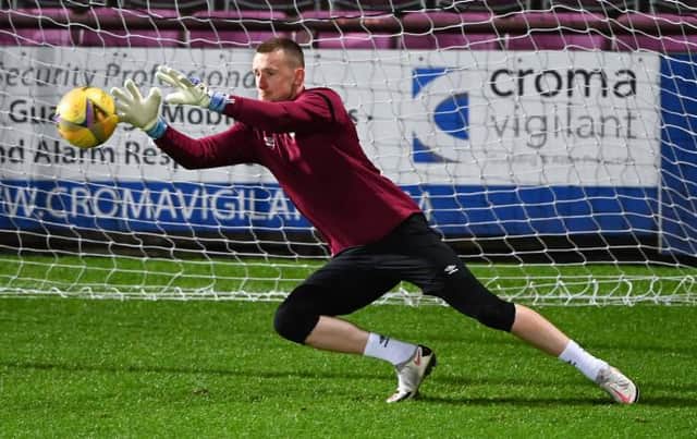 Hearts' Ross Stewart warms up ahead of a Betfred Cup match between Hearts and Raith Rovers (Photo by Bill Murray / SNS Group)