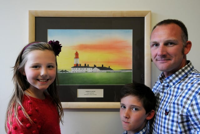 These paintings were donated to the Oncology ward at South Tyneside District Hospital in 2012 and Chris Jennings was pictured taking a look with son Joe, 12, and daughter Lara, 8.