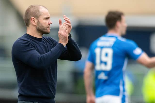 Robbie Neilson applauds the back received for his team from the Hearts support after Saturday's 2-1 defeat at Kilmarnock. Picture: SNS