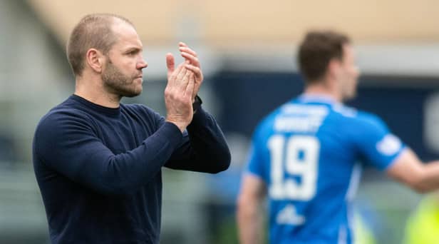 Robbie Neilson applauds the back received for his team from the Hearts support after Saturday's 2-1 defeat at Kilmarnock. Picture: SNS
