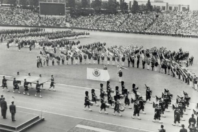 A pipe band performs at the 1970 Edinburgh Commonwealth Games opening ceremony.