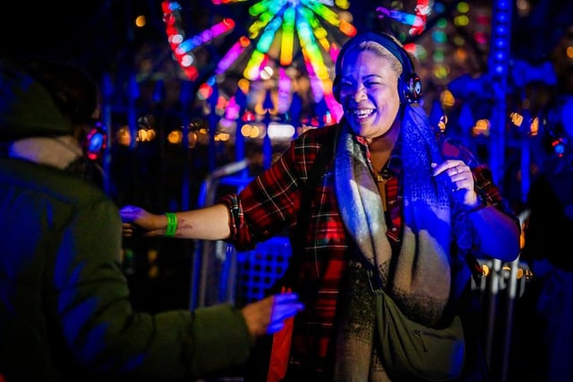 Street party revellers enjoyed the silent disco at the 2023 Edinburgh's Hogmanay festival.