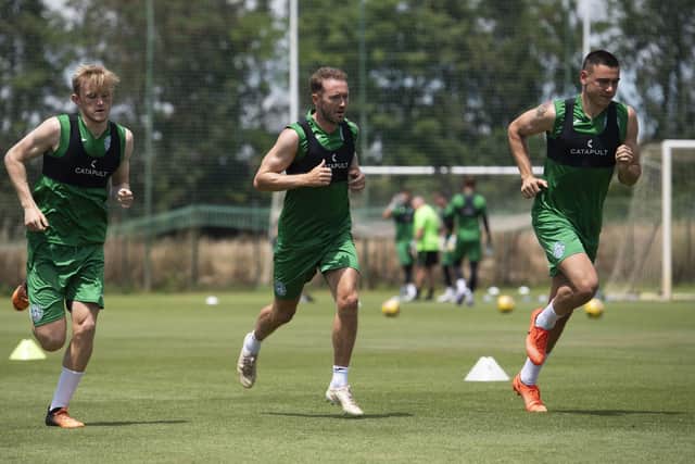 Ewan Henderson, Aiden McGeady, and Miller put in the hard yards at the Amendoeira Golf Resort. Picture: Craig Foy / SNS Group