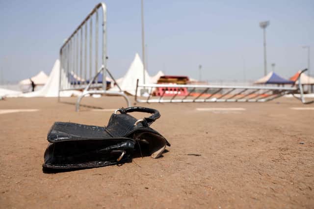 The entrance of Olembe Stadium in Yaounde shows barriers on the ground at the scene of the stampede