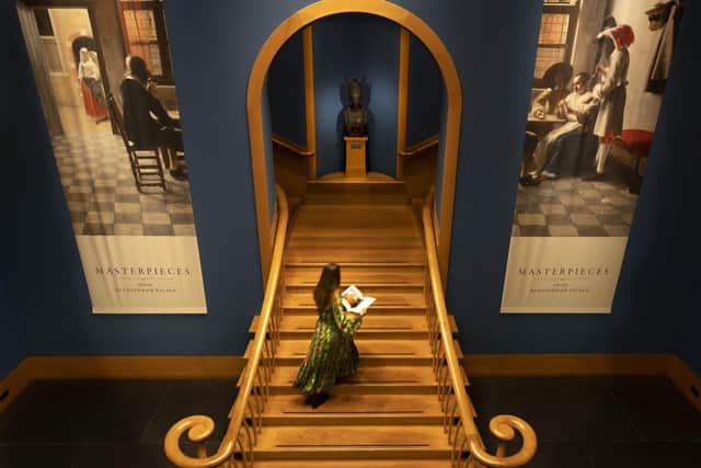A member of staff making final checks in The Queen's Gallery at the Palace of Holyroodhouse in Edinburgh ahead of the 'Masterpieces from Buckingham Palace' exhibition at the Palace of Holyroodhouse.