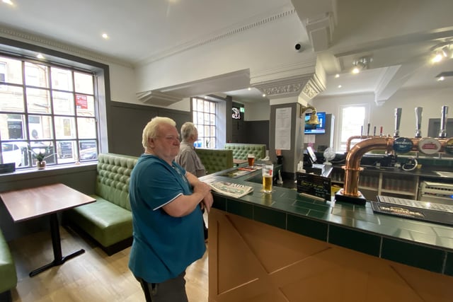 Logan's Rest has proved to be popular with the locals in Restalrig since it reopened, and here you can see a customer enjoying a quiet pint with a copy of the Edinburgh Evening News on the bar.