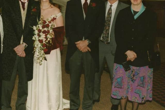 Jason Collie's wedding picture from 1998. Pictured L-R: Jason Collie, his wife Sarah, his father Fred Collie, an uncle from the other side of the family and Elaine